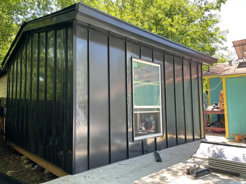 Black standing seam metal wall panels for Roof Inspection in Macomb