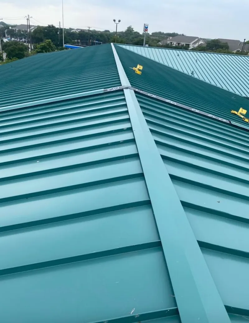 Green commercial metal roof ridge and valley for Metal Roof Repair in Macomb